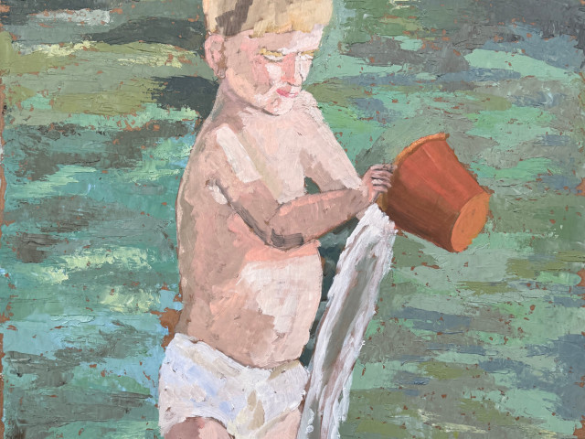 Niño jugando en el agua